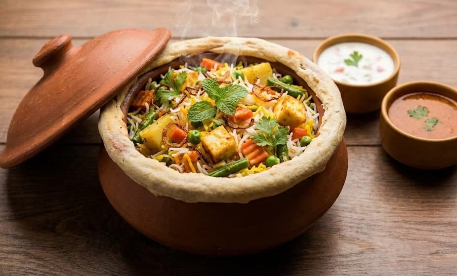 Veg Handi Biryani served in a large handi, our closest match to a catering spread